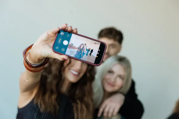Stylists taking a selfie together
