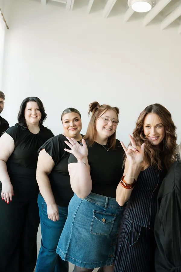 Stylists posing close together